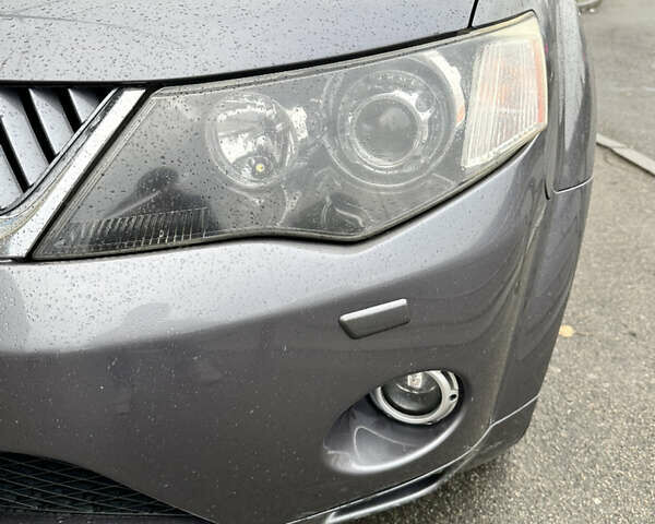 Серый Мицубиси Аутлендер, объемом двигателя 3 л и пробегом 279 тыс. км за 11300 $, фото 6 на Automoto.ua