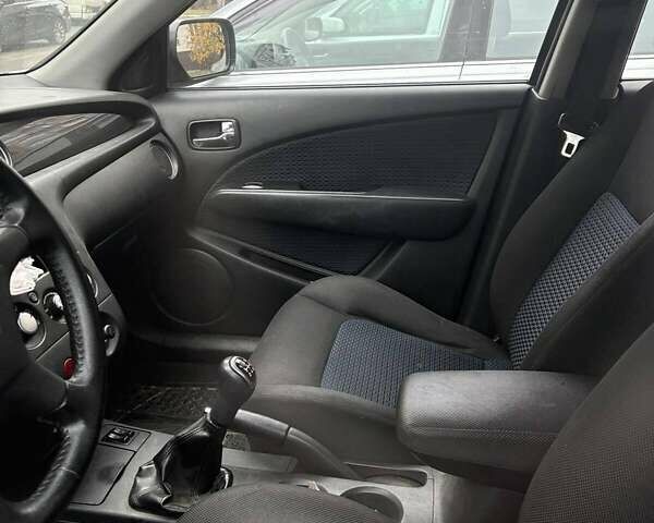 Сірий Міцубісі Аутлендер, об'ємом двигуна 2 л та пробігом 199 тис. км за 7600 $, фото 11 на Automoto.ua