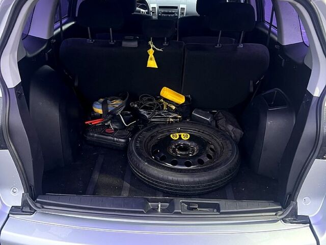 Серый Мицубиси Аутлендер, объемом двигателя 2.4 л и пробегом 241 тыс. км за 8200 $, фото 12 на Automoto.ua