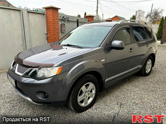 Серый Мицубиси Аутлендер, объемом двигателя 2.4 л и пробегом 153 тыс. км за 11500 $, фото 5 на Automoto.ua