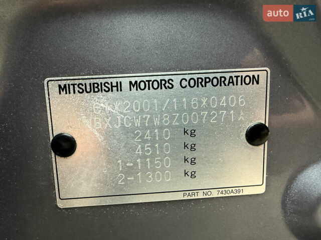 Серый Мицубиси Аутлендер, объемом двигателя 2.2 л и пробегом 162 тыс. км за 10000 $, фото 53 на Automoto.ua