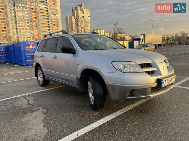 Серый Мицубиси Аутлендер, объемом двигателя 2 л и пробегом 138 тыс. км за 7000 $, фото 8 на Automoto.ua