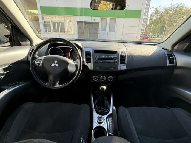 Серый Мицубиси Аутлендер, объемом двигателя 2.4 л и пробегом 43 тыс. км за 9500 $, фото 6 на Automoto.ua