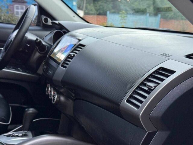 Серый Мицубиси Аутлендер, объемом двигателя 2.4 л и пробегом 171 тыс. км за 9199 $, фото 16 на Automoto.ua