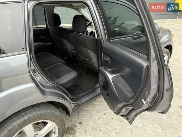 Серый Мицубиси Аутлендер, объемом двигателя 2.2 л и пробегом 162 тыс. км за 10000 $, фото 39 на Automoto.ua