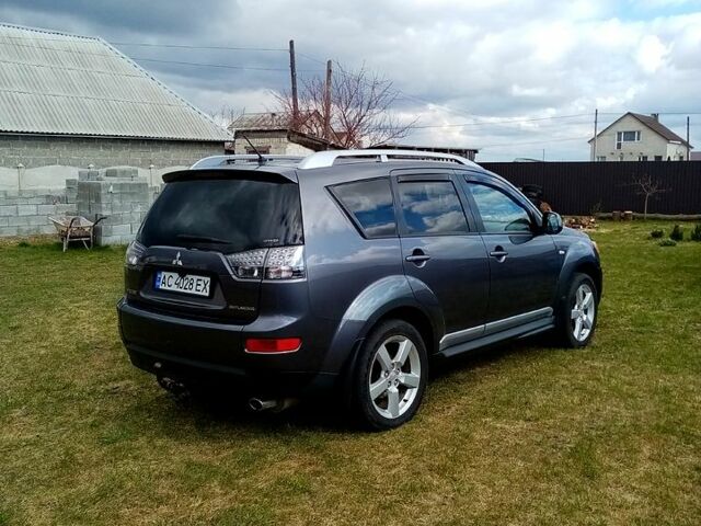 Серый Мицубиси Аутлендер, объемом двигателя 2.4 л и пробегом 307 тыс. км за 9200 $, фото 6 на Automoto.ua