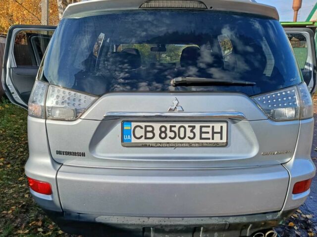 Мицубиси Аутлендер 2009 в Новгород-Северском на Automoto.ua Серый Мицубиси Аутлендер, объемом двигателя 2.2 л и пробегом 242 тыс. км за 11700 $, фото 4 на Automoto.ua