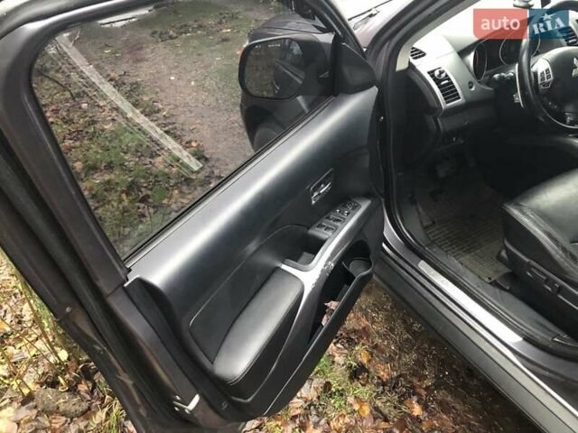 Серый Мицубиси Аутлендер, объемом двигателя 2.4 л и пробегом 198 тыс. км за 9449 $, фото 6 на Automoto.ua