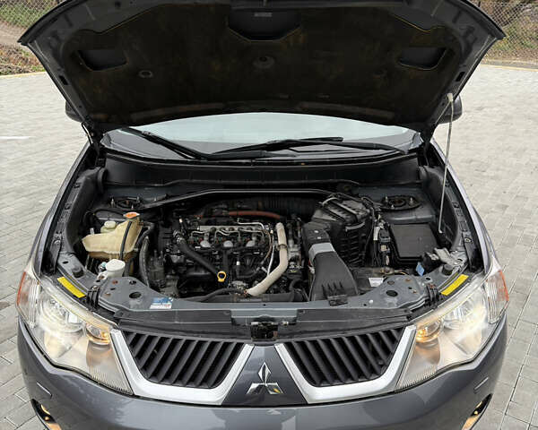 Серый Мицубиси Аутлендер, объемом двигателя 2.2 л и пробегом 162 тыс. км за 10000 $, фото 50 на Automoto.ua