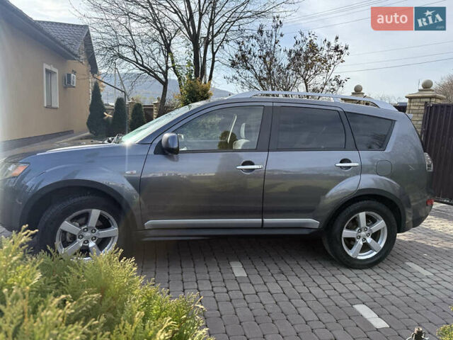 Серый Мицубиси Аутлендер, объемом двигателя 1.97 л и пробегом 242 тыс. км за 8999 $, фото 4 на Automoto.ua