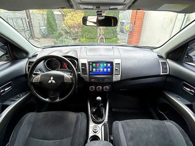 Серый Мицубиси Аутлендер, объемом двигателя 2.4 л и пробегом 153 тыс. км за 11500 $, фото 6 на Automoto.ua