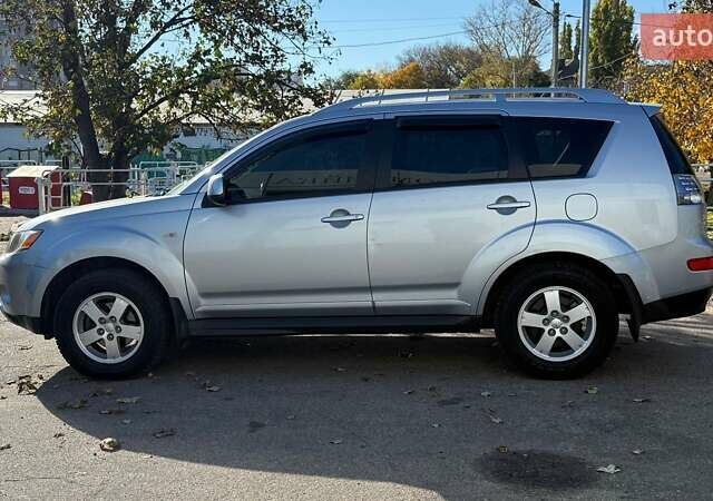 Серый Мицубиси Аутлендер, объемом двигателя 2.36 л и пробегом 45 тыс. км за 9500 $, фото 7 на Automoto.ua