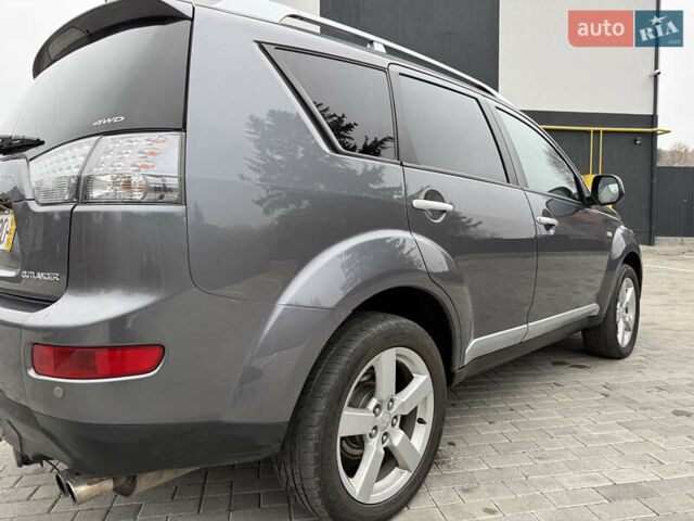 Серый Мицубиси Аутлендер, объемом двигателя 2.2 л и пробегом 162 тыс. км за 10000 $, фото 16 на Automoto.ua