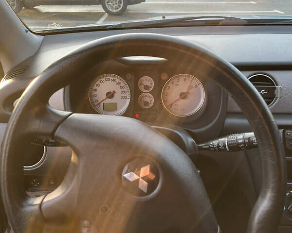 Серый Мицубиси Аутлендер, объемом двигателя 2 л и пробегом 138 тыс. км за 7000 $, фото 25 на Automoto.ua