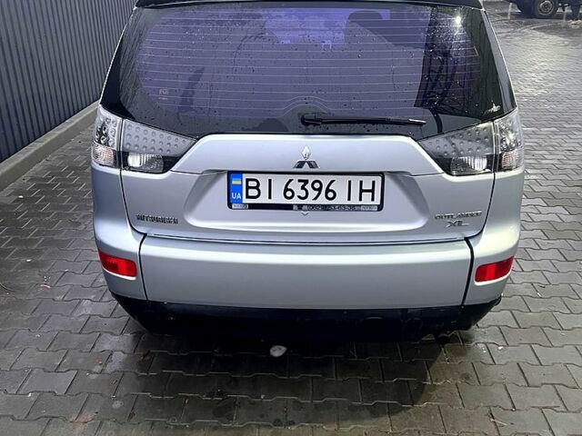 Мицубиси Аутлендер 2009 в Полтаве на Automoto.ua Серый Мицубиси Аутлендер, объемом двигателя 2.4 л и пробегом 223 тыс. км за 8600 $, фото 4 на Automoto.ua