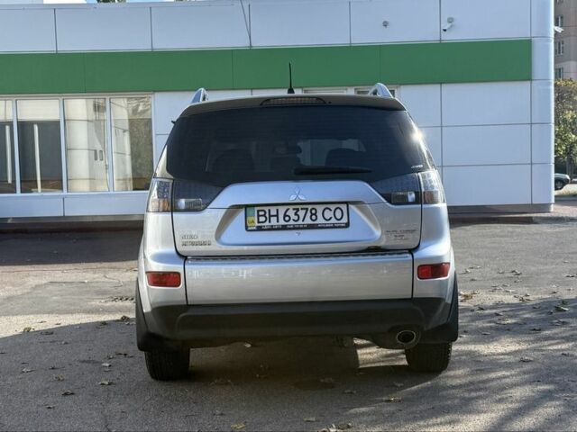 Серый Мицубиси Аутлендер, объемом двигателя 2.4 л и пробегом 43 тыс. км за 9500 $, фото 3 на Automoto.ua