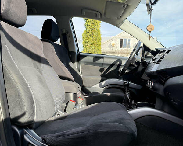 Серый Мицубиси Аутлендер, объемом двигателя 1.97 л и пробегом 242 тыс. км за 8999 $, фото 7 на Automoto.ua