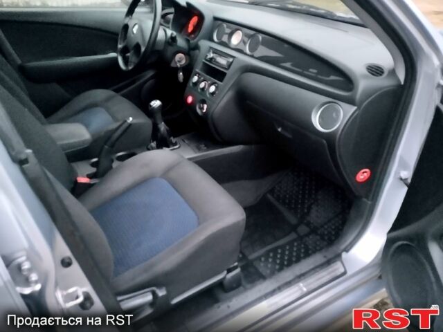 Серый Мицубиси Аутлендер, объемом двигателя 2 л и пробегом 198 тыс. км за 7700 $, фото 10 на Automoto.ua