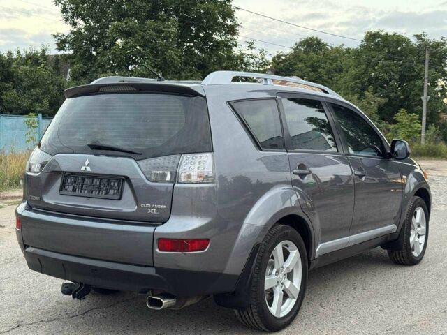Серый Мицубиси Аутлендер, объемом двигателя 2.4 л и пробегом 171 тыс. км за 9199 $, фото 6 на Automoto.ua