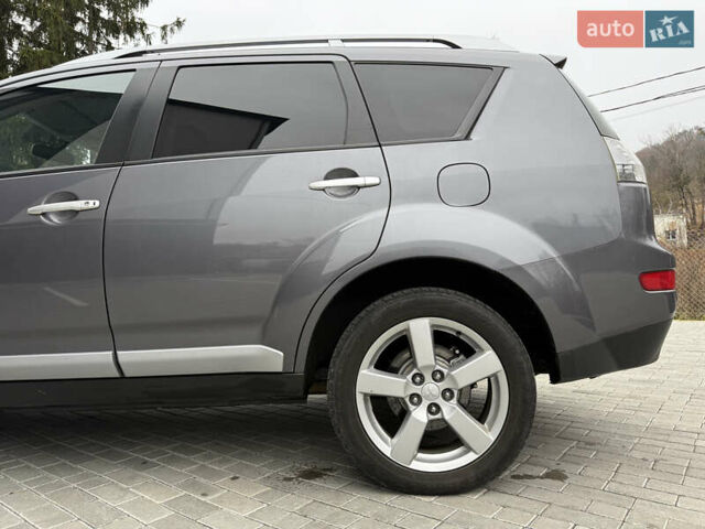 Серый Мицубиси Аутлендер, объемом двигателя 2.2 л и пробегом 162 тыс. км за 10000 $, фото 15 на Automoto.ua