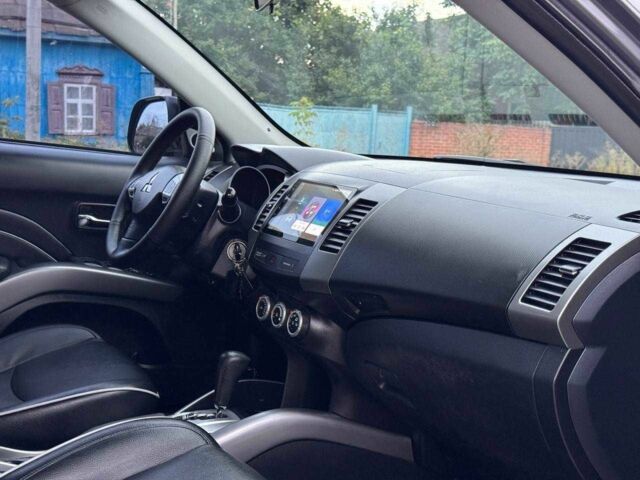 Серый Мицубиси Аутлендер, объемом двигателя 2.4 л и пробегом 171 тыс. км за 9199 $, фото 12 на Automoto.ua