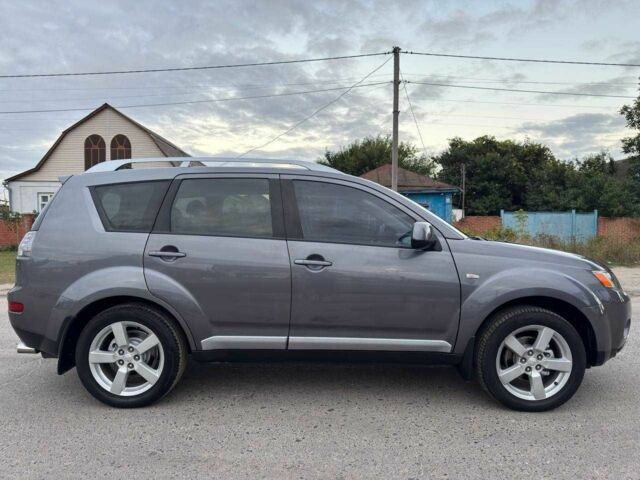 Серый Мицубиси Аутлендер, объемом двигателя 2.4 л и пробегом 171 тыс. км за 9199 $, фото 3 на Automoto.ua