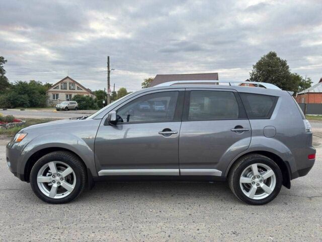 Серый Мицубиси Аутлендер, объемом двигателя 2.4 л и пробегом 171 тыс. км за 9199 $, фото 4 на Automoto.ua