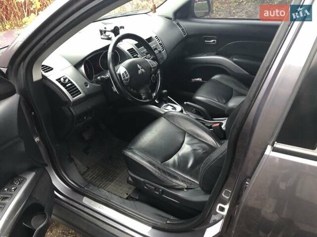Серый Мицубиси Аутлендер, объемом двигателя 2.4 л и пробегом 198 тыс. км за 9449 $, фото 7 на Automoto.ua