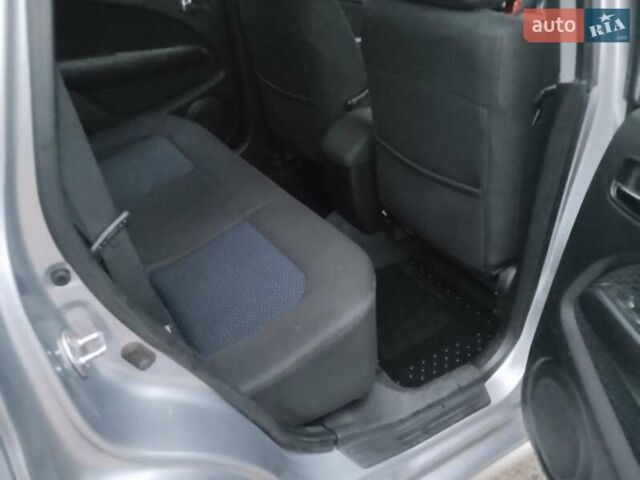 Сірий Міцубісі Аутлендер, об'ємом двигуна 2 л та пробігом 199 тис. км за 7600 $, фото 14 на Automoto.ua