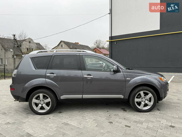 Серый Мицубиси Аутлендер, объемом двигателя 2.2 л и пробегом 162 тыс. км за 10000 $, фото 7 на Automoto.ua