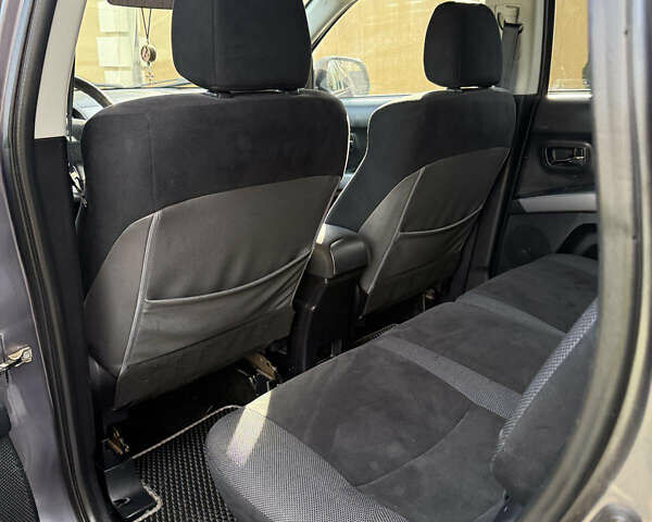 Серый Мицубиси Аутлендер, объемом двигателя 1.97 л и пробегом 242 тыс. км за 8999 $, фото 13 на Automoto.ua