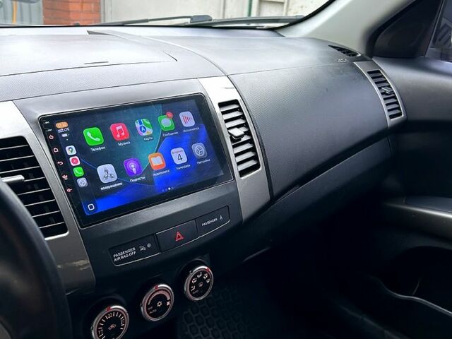 Серый Мицубиси Аутлендер, объемом двигателя 2.4 л и пробегом 153 тыс. км за 11500 $, фото 7 на Automoto.ua