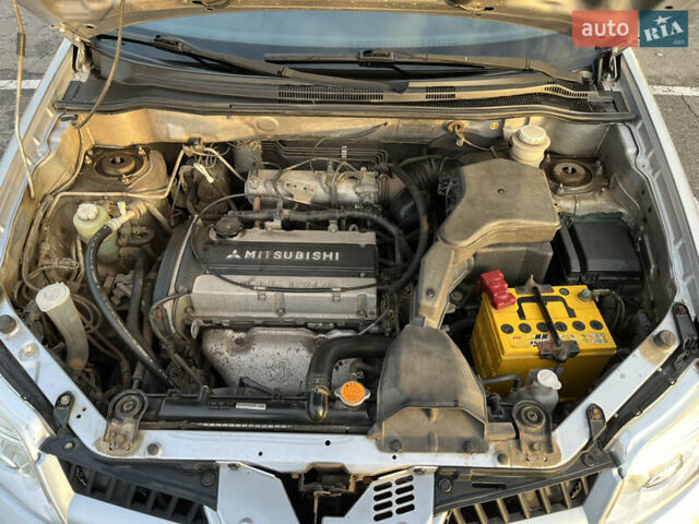 Серый Мицубиси Аутлендер, объемом двигателя 2 л и пробегом 138 тыс. км за 7000 $, фото 31 на Automoto.ua