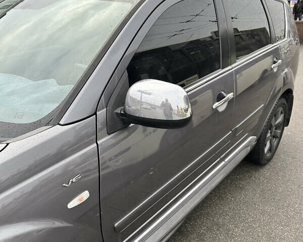 Серый Мицубиси Аутлендер, объемом двигателя 3 л и пробегом 279 тыс. км за 11300 $, фото 19 на Automoto.ua