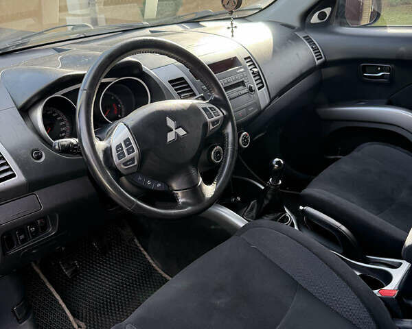 Серый Мицубиси Аутлендер, объемом двигателя 1.97 л и пробегом 242 тыс. км за 8999 $, фото 20 на Automoto.ua