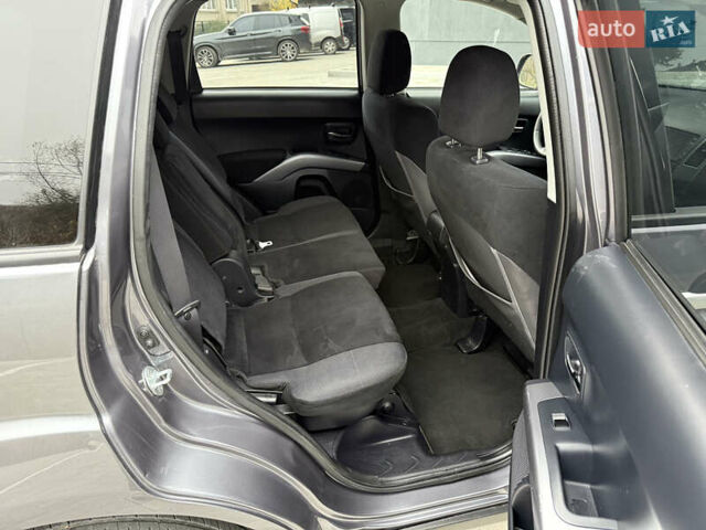 Серый Мицубиси Аутлендер, объемом двигателя 2.2 л и пробегом 162 тыс. км за 10000 $, фото 40 на Automoto.ua
