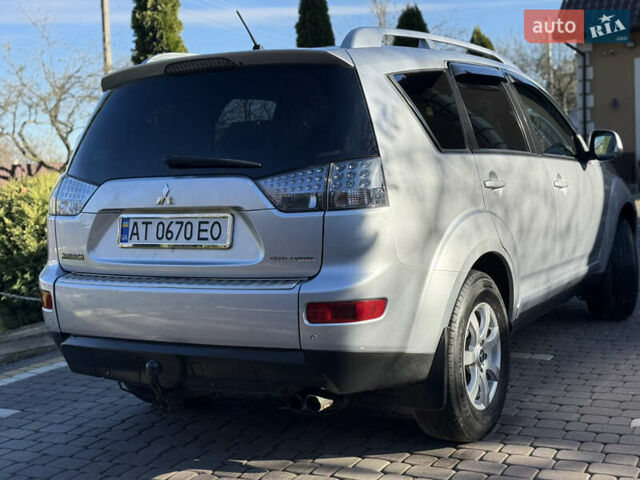 Серый Мицубиси Аутлендер, объемом двигателя 2 л и пробегом 268 тыс. км за 8950 $, фото 4 на Automoto.ua