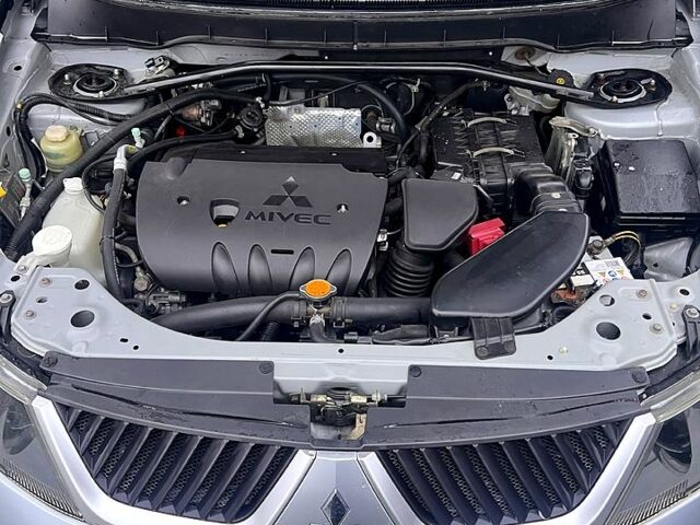 Мицубиси Аутлендер 2009 в Полтаве на Automoto.ua Серый Мицубиси Аутлендер, объемом двигателя 2.4 л и пробегом 223 тыс. км за 8600 $, фото 12 на Automoto.ua