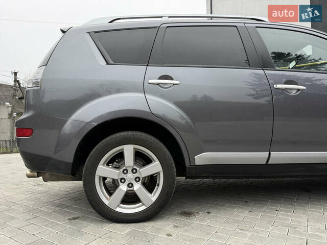 Серый Мицубиси Аутлендер, объемом двигателя 2.2 л и пробегом 162 тыс. км за 10000 $, фото 19 на Automoto.ua