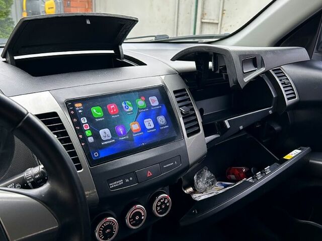 Серый Мицубиси Аутлендер, объемом двигателя 2.4 л и пробегом 153 тыс. км за 11500 $, фото 8 на Automoto.ua