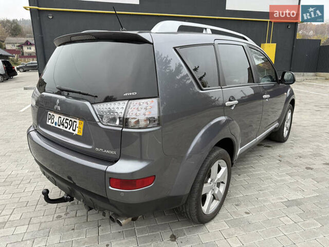 Серый Мицубиси Аутлендер, объемом двигателя 2.2 л и пробегом 162 тыс. км за 10000 $, фото 10 на Automoto.ua