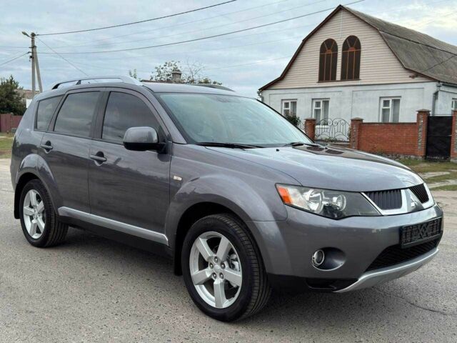 Серый Мицубиси Аутлендер, объемом двигателя 2.4 л и пробегом 171 тыс. км за 9199 $, фото 1 на Automoto.ua