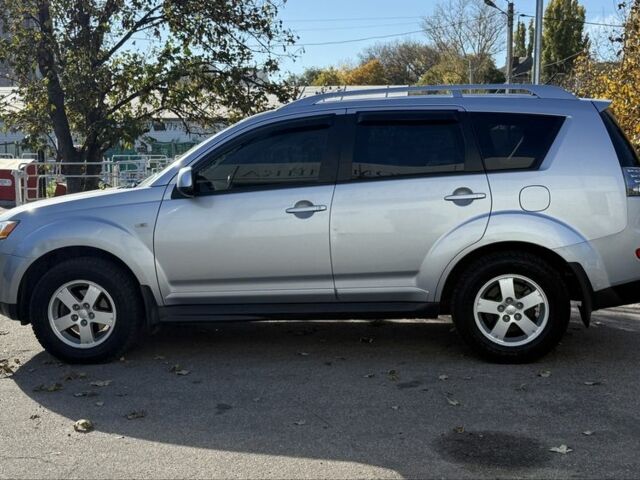 Серый Мицубиси Аутлендер, объемом двигателя 2.4 л и пробегом 43 тыс. км за 9500 $, фото 5 на Automoto.ua