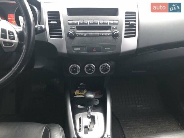 Серый Мицубиси Аутлендер, объемом двигателя 2.4 л и пробегом 198 тыс. км за 9449 $, фото 9 на Automoto.ua