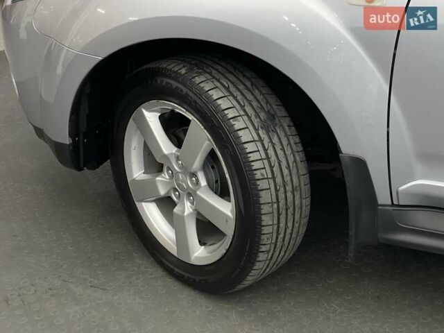Сірий Міцубісі Аутлендер, об'ємом двигуна 2.4 л та пробігом 74 тис. км за 10676 $, фото 7 на Automoto.ua