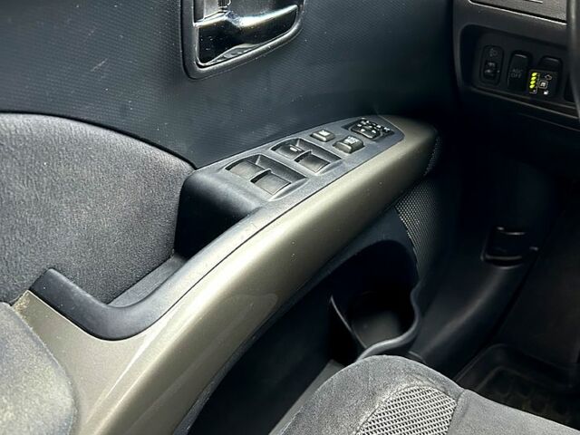 Серый Мицубиси Аутлендер, объемом двигателя 2.4 л и пробегом 153 тыс. км за 11500 $, фото 9 на Automoto.ua