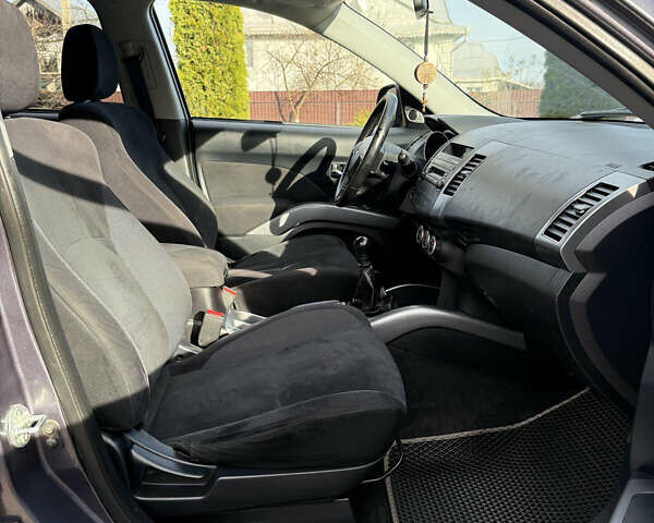 Серый Мицубиси Аутлендер, объемом двигателя 1.97 л и пробегом 242 тыс. км за 8999 $, фото 8 на Automoto.ua