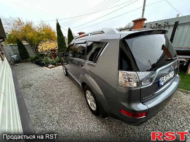 Серый Мицубиси Аутлендер, объемом двигателя 2.4 л и пробегом 153 тыс. км за 11500 $, фото 4 на Automoto.ua