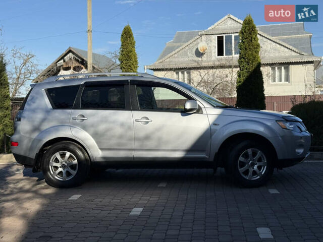 Серый Мицубиси Аутлендер, объемом двигателя 2 л и пробегом 268 тыс. км за 8950 $, фото 2 на Automoto.ua