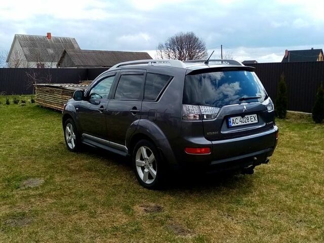 Серый Мицубиси Аутлендер, объемом двигателя 2.4 л и пробегом 307 тыс. км за 9200 $, фото 5 на Automoto.ua